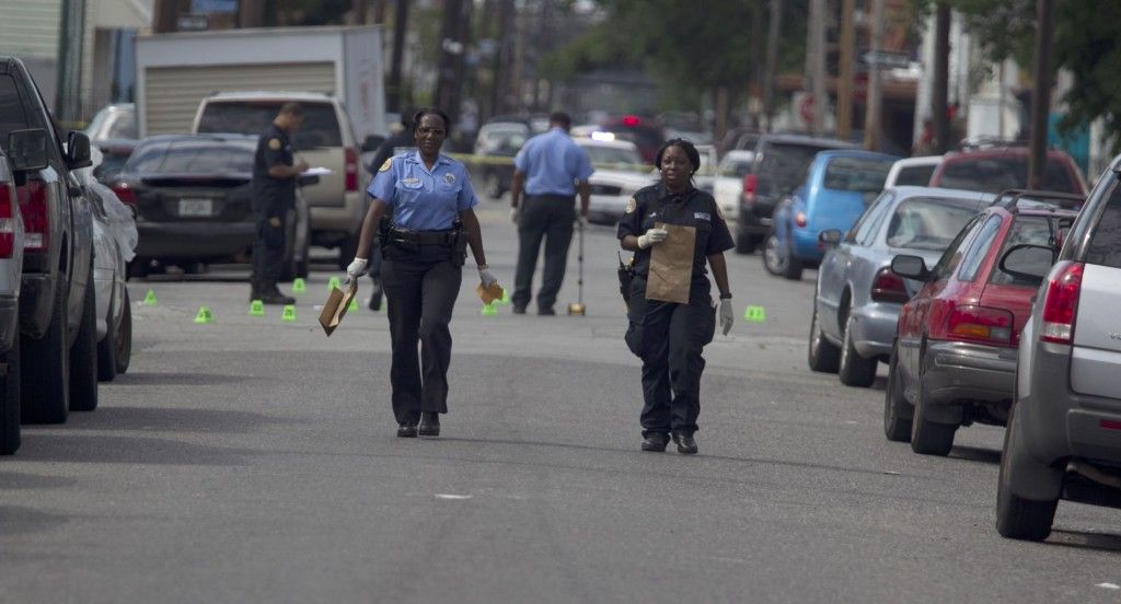 Police gather evidence in new orleans shooting